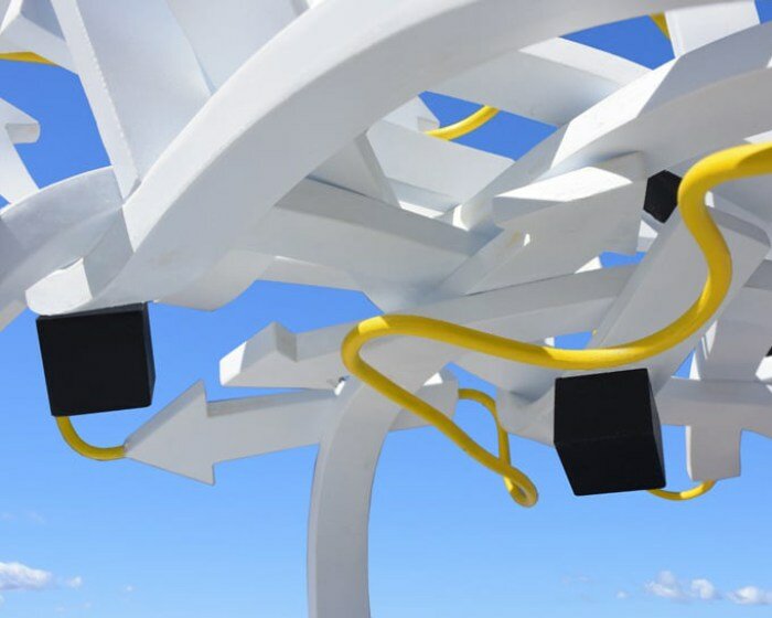 steel arrows, rods, and cubes intertwine to form michael jantzen's vast protein pavilion