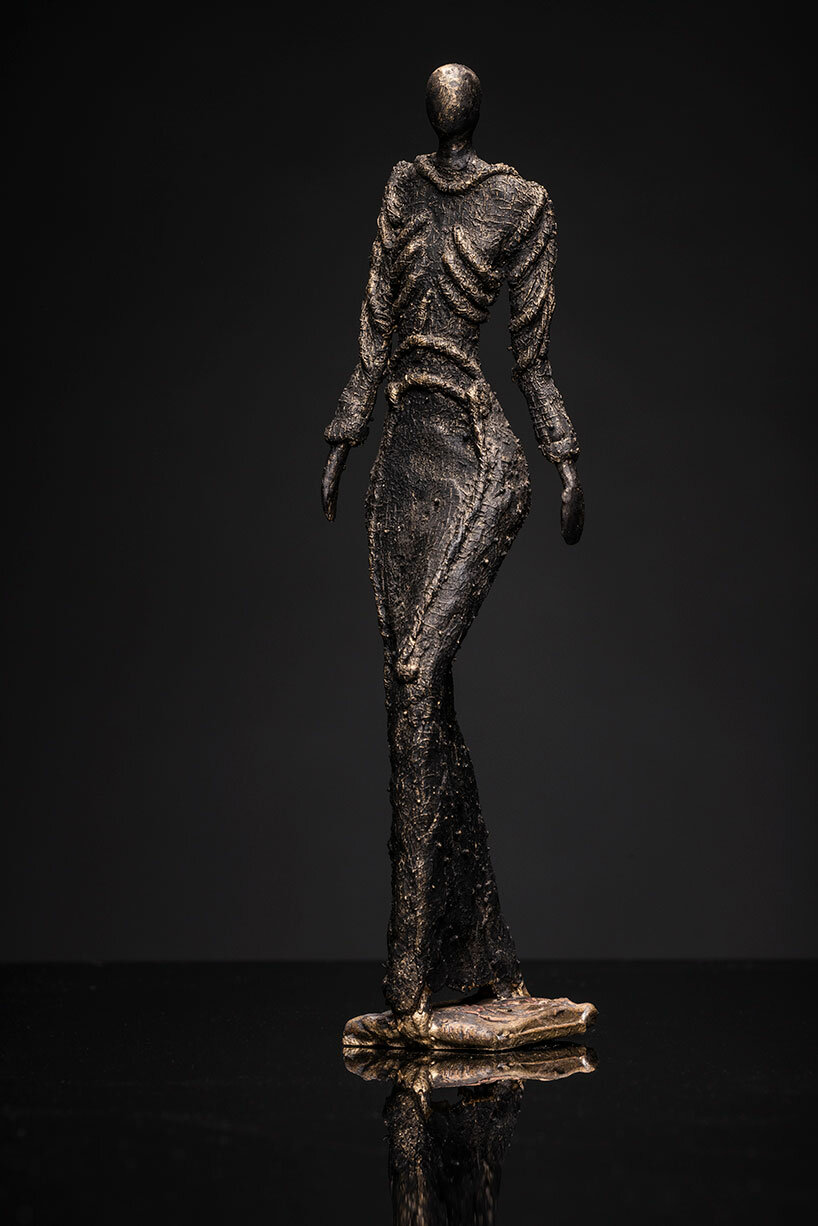 schiaparelli and chanel celebrated in london exhibition with bronze sculptures by robyn neild