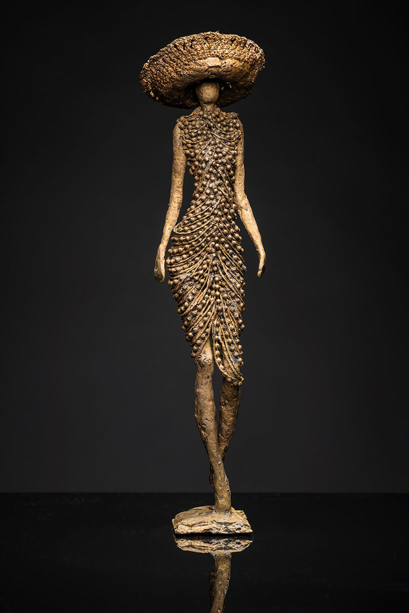schiaparelli and chanel celebrated in london exhibition with bronze sculptures by robyn neild