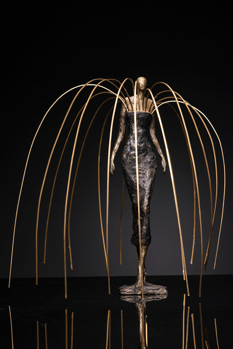 schiaparelli and chanel celebrated in london exhibition with bronze sculptures by robyn neild