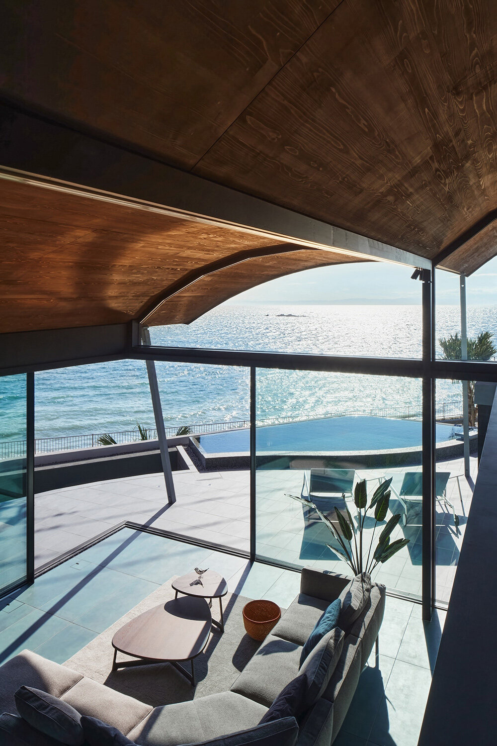 teamSTAR crowns villa A with a vaulted roof echoing japan's rolling ocean waves