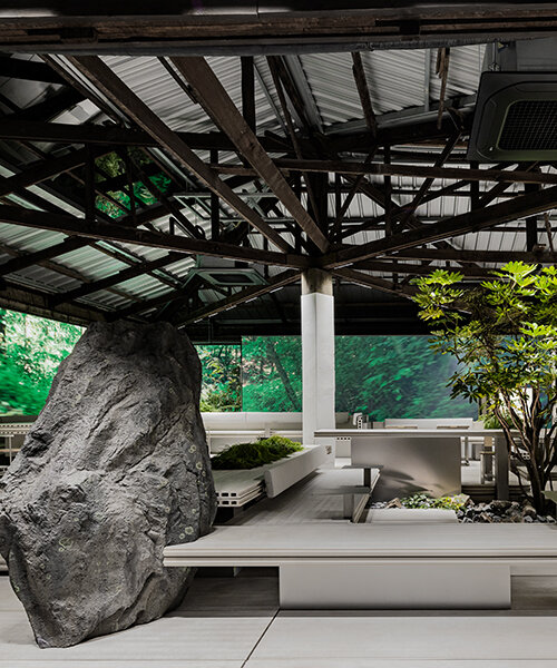 WGNB's beauty store in seoul recreates imaginary island landscape with giant rocks