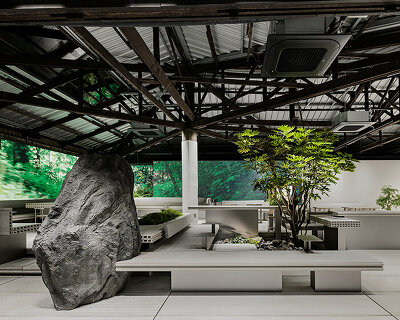 WGNB's beauty store in seoul recreates imaginary island landscape with giant rocks