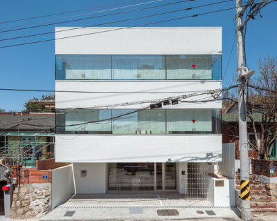 wood hanji shades and intricate metal screens wrap liso architects white office in korea