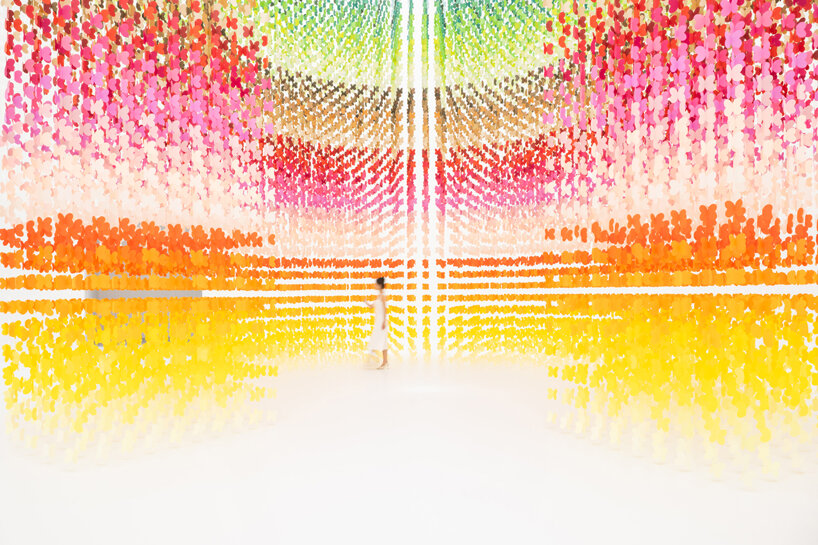 emmanuelle moureaux's colorful installation veils visitors amidst a ...