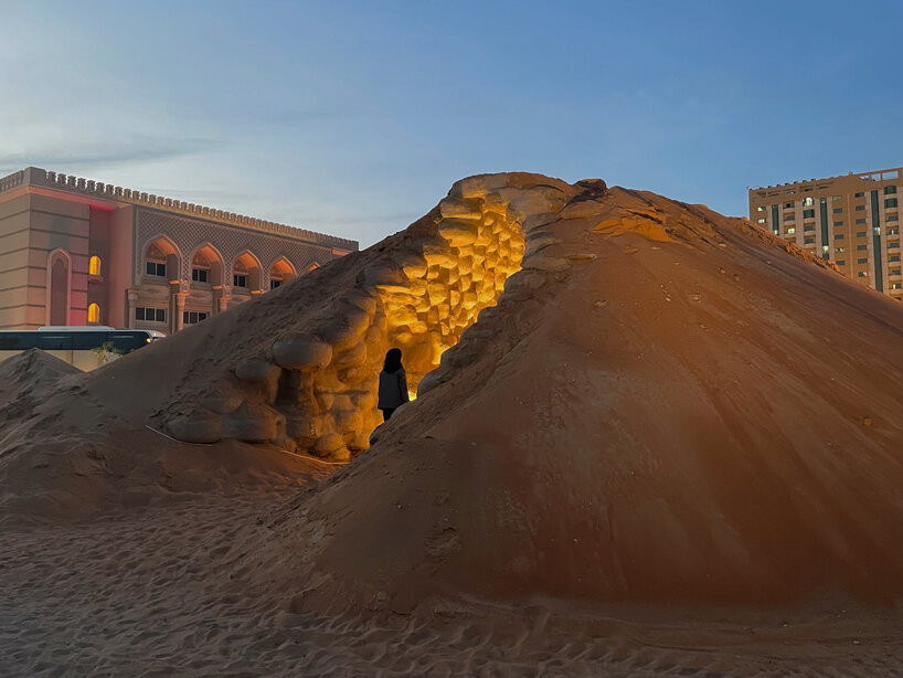 wallmakers uses 1,425 discarded tires coated in desert sand for sharjah triennial pavilion