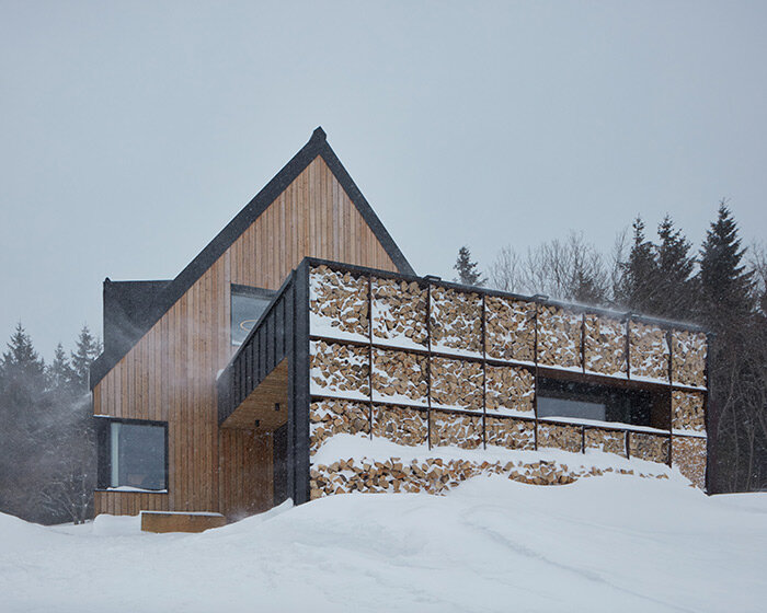 a modern A-frame cottage by ADR & formafatal is hidden among czech mountains