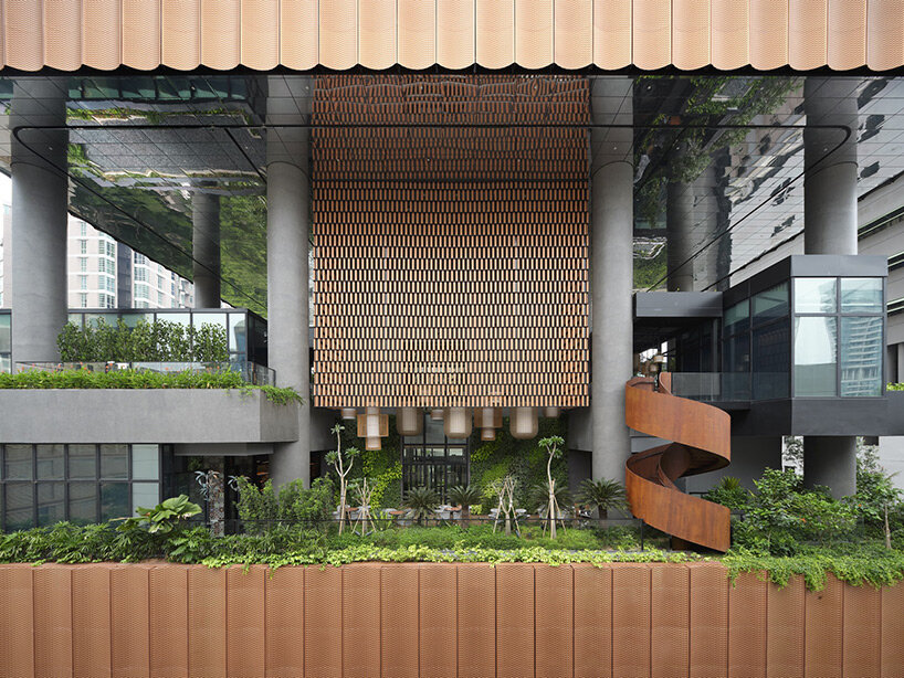 terracotta facade of hanging gardens fronts artyzen singapore hotel by ONG&ONG