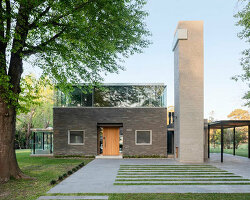 cabin 192's brick volume upholds glazed box in suburban area of buenos aires