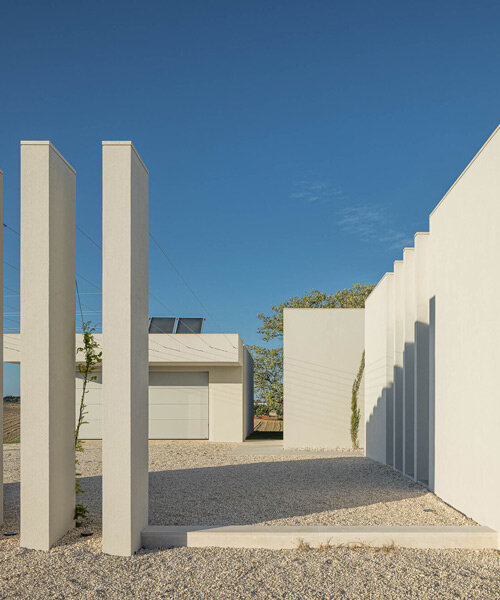portuguese studio dp arquitectos curates 'casa em romeira' with sunny minimalism