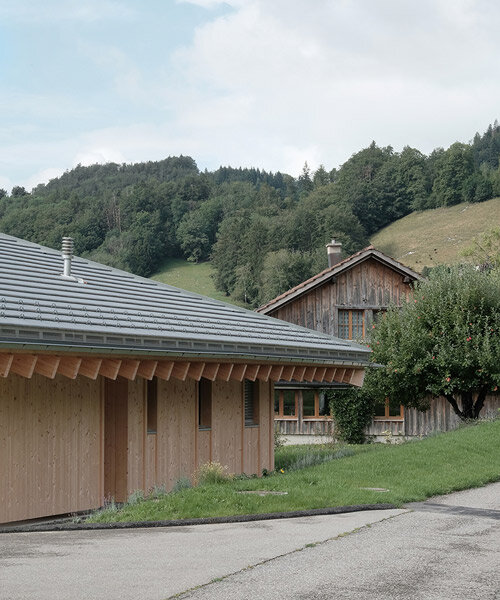 swiss architect charly jolliet tops this minimalist alpine house with a pyramid roof