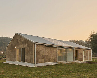 a cork and wood house is built in northern spain by gurea arquitectura cooperativa
