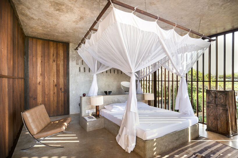 PAT.'s stilted falcon house is an ode to tropical modernism on kenya's manda island