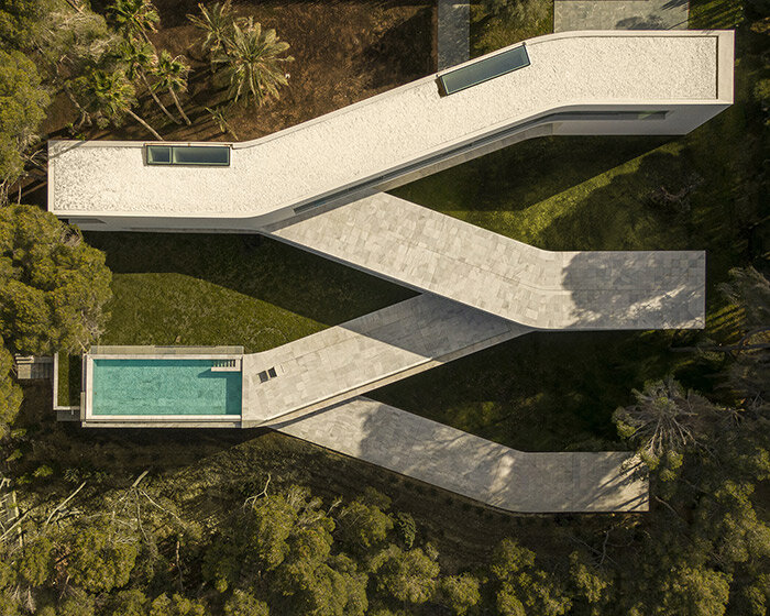 fran silvestre shapes casa sabater by its sloping coastal site in spain