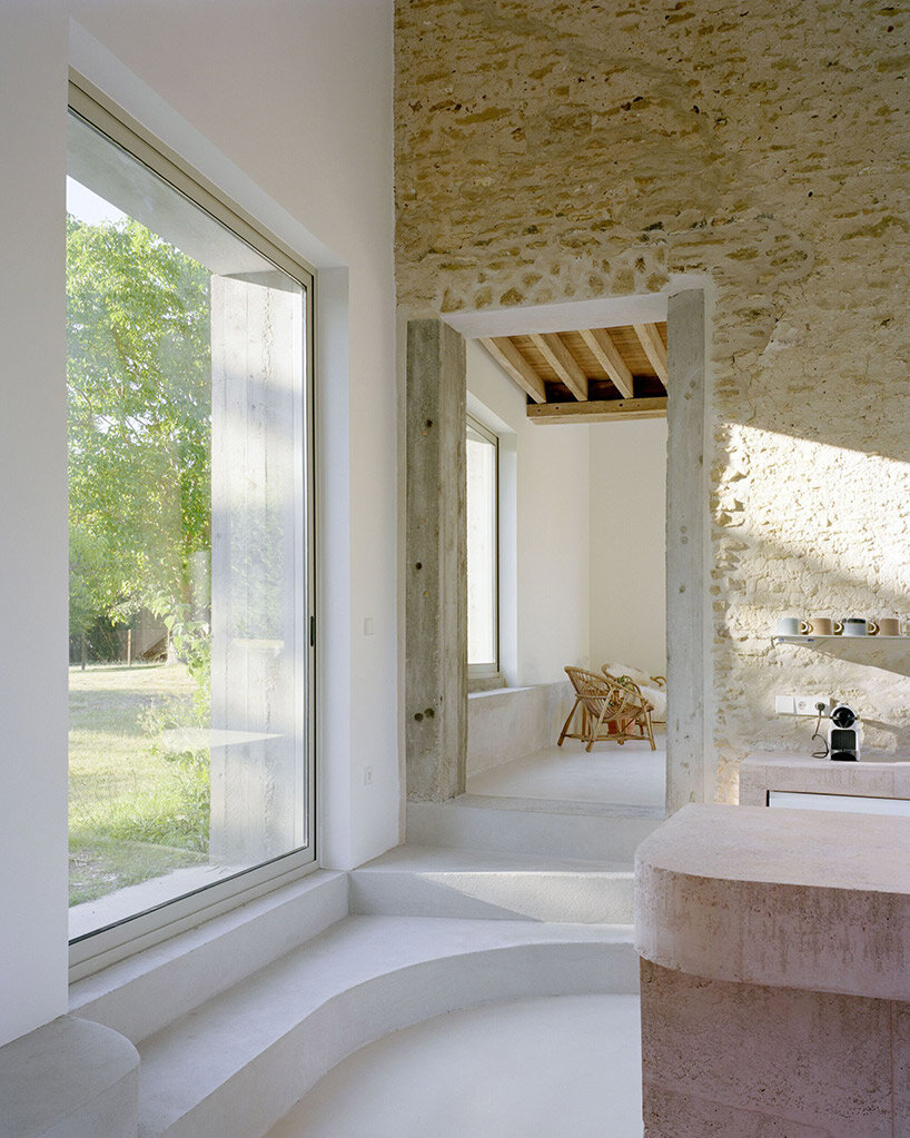 historic french farmhouse renovated to become studio guma's modern hécourt house
