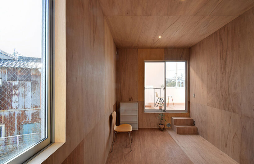 hiroshi kinoshita weaves all-season comfort into snug 'house with indoor garden' in japan