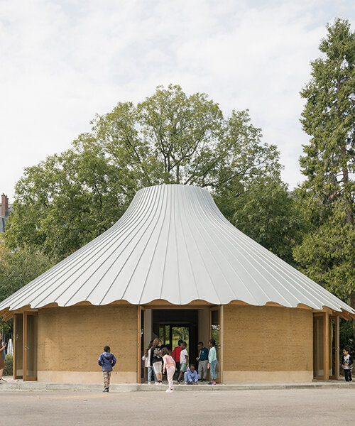l'atelier senzu builds carousel-inspired rammed earth pavilion for parisian school