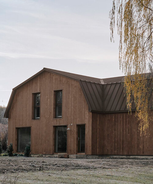aging wood planks embrace the exterior of maison melba in quebec