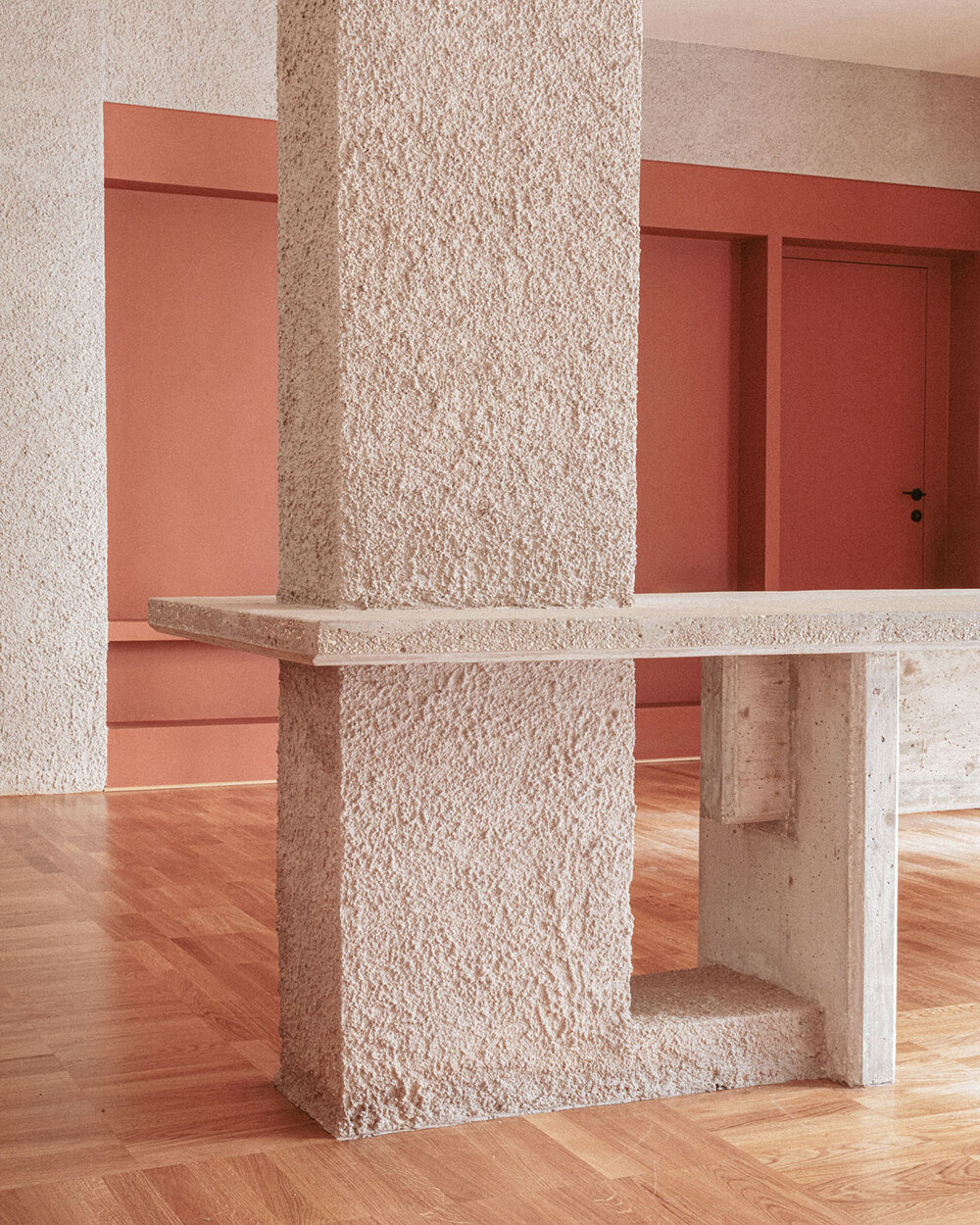 exposed column takes center stage inside studio traccia's renovated 1970s flat in rome