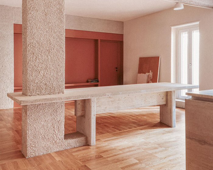 exposed column takes center stage inside studio traccia's renovated 1970s flat in rome