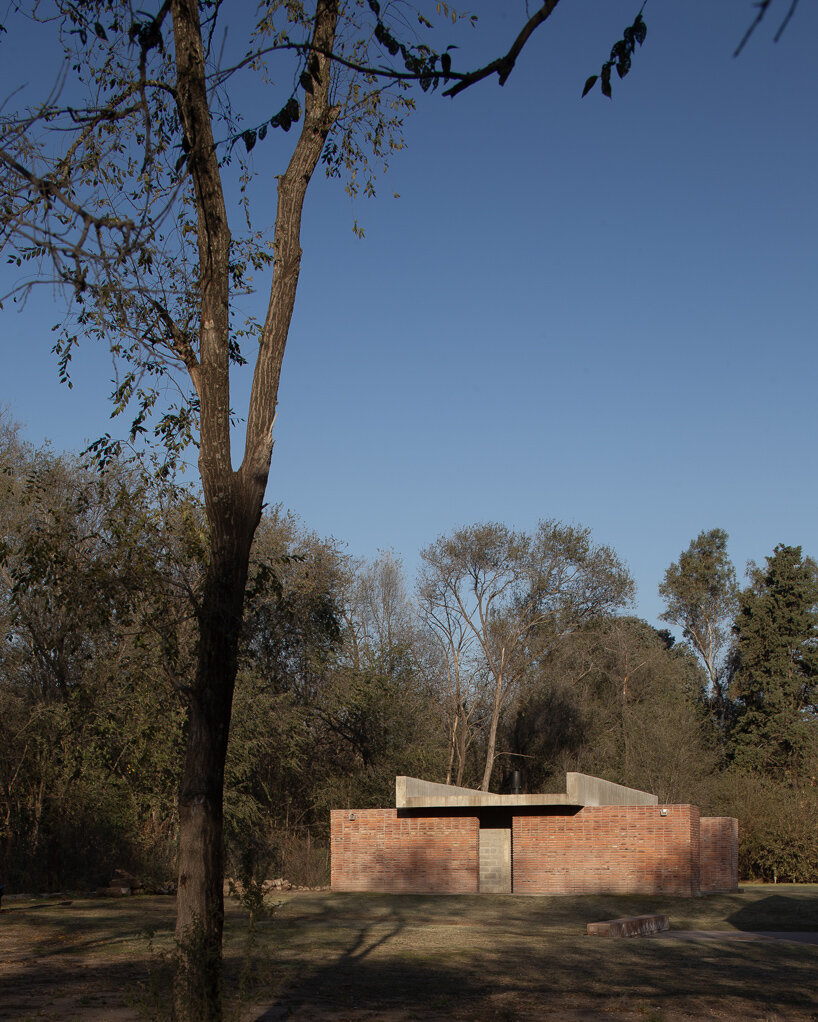 brick-walled communal space embraces argentinian barbecue ritual