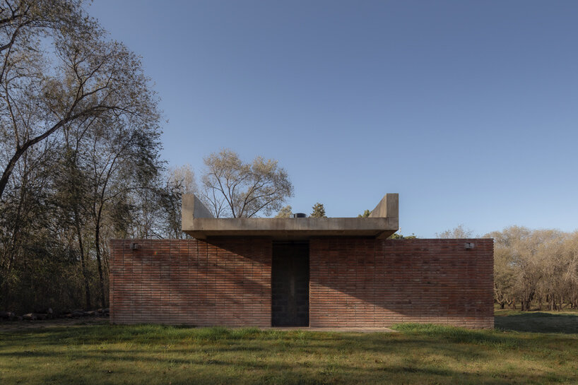 brick-walled communal space embraces argentinian barbecue ritual