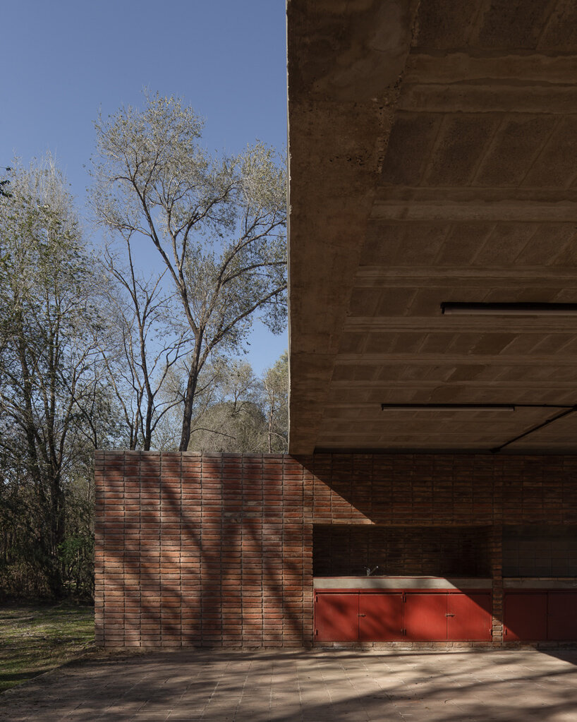 brick-walled communal space embraces argentinian barbecue ritual