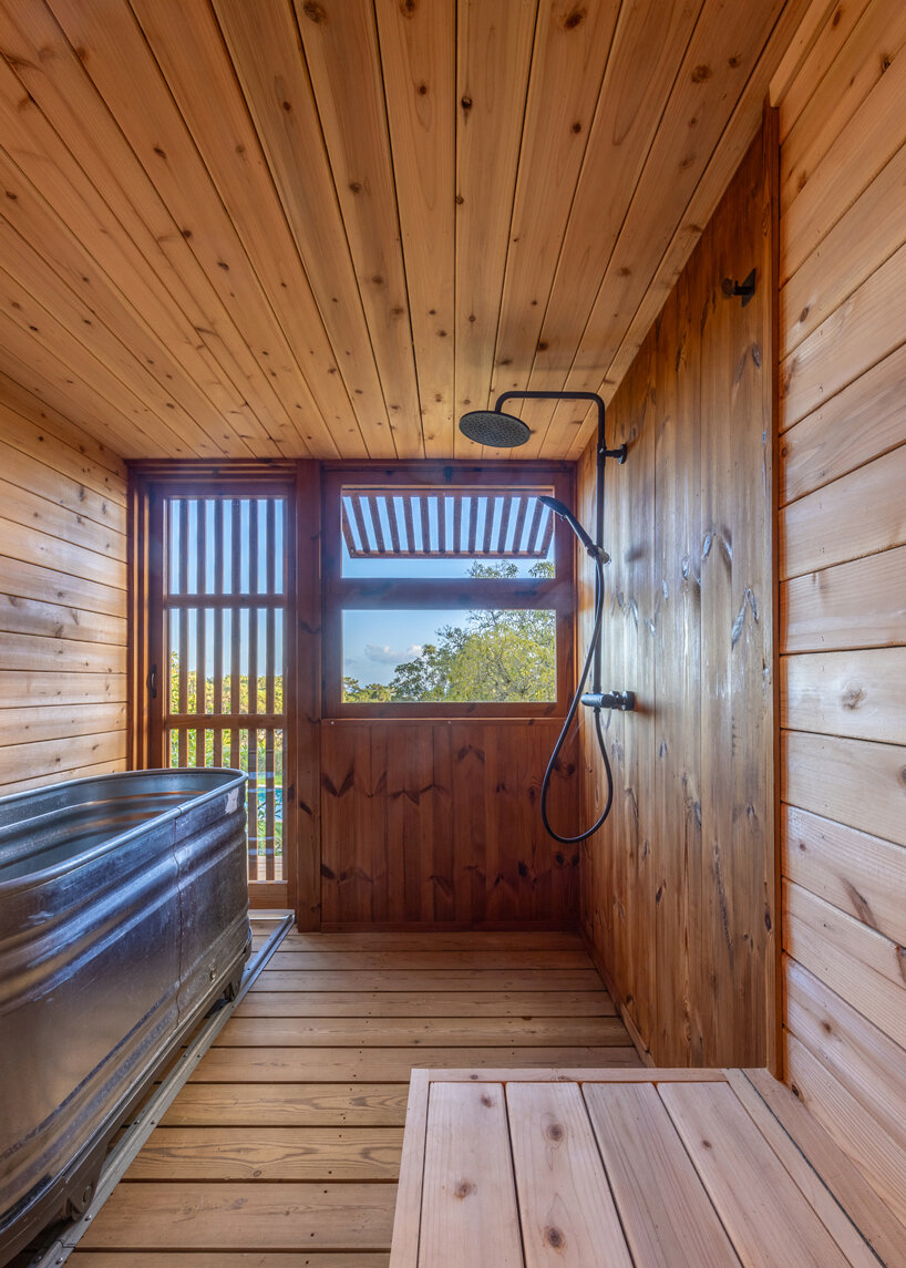 madeiguincho's wooden sauna frames panoramic views of the lush portuguese landscape