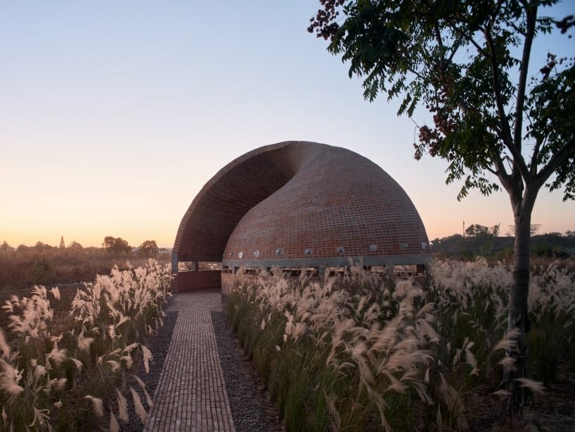 Hcch Studio Stacks Hundreds Of Red Bricks To Craft Spiral Shell Library 