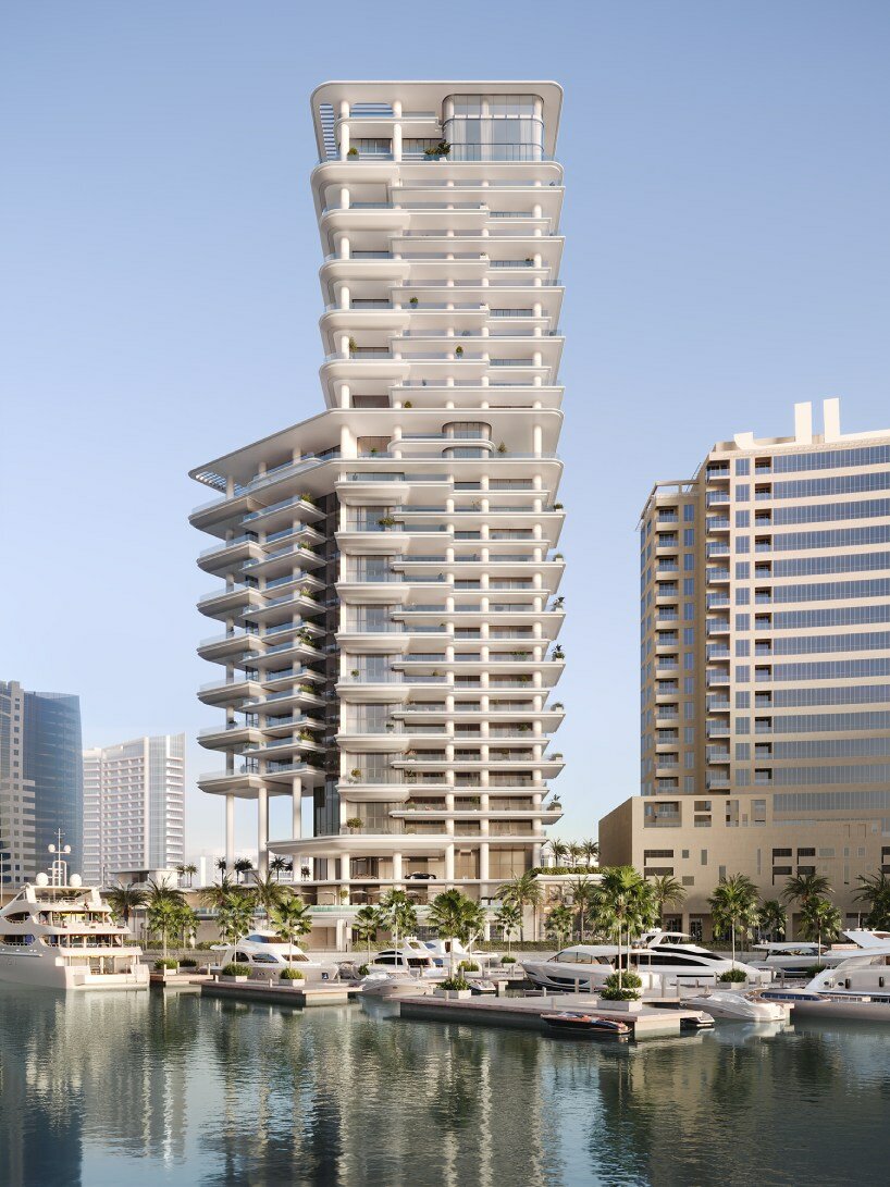 fluid curves and wraparound pools embrace foster + partners' waterfront tower in dubai