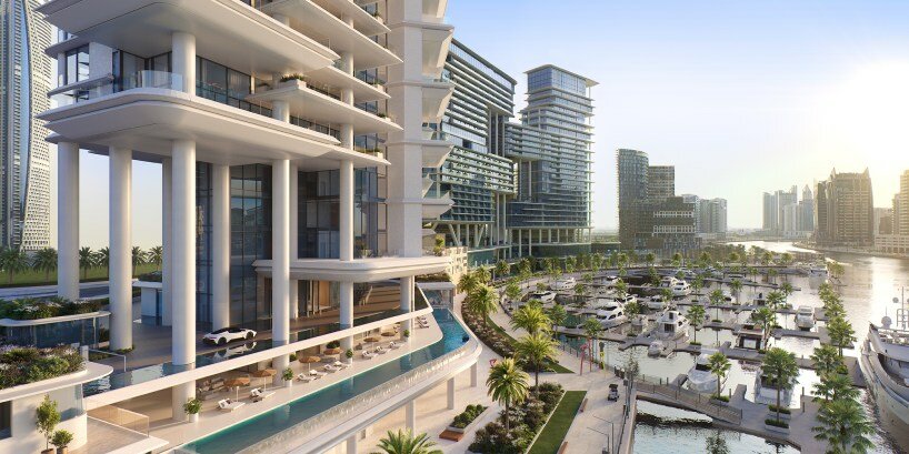 fluid curves and wraparound pools embrace foster + partners' waterfront tower in dubai