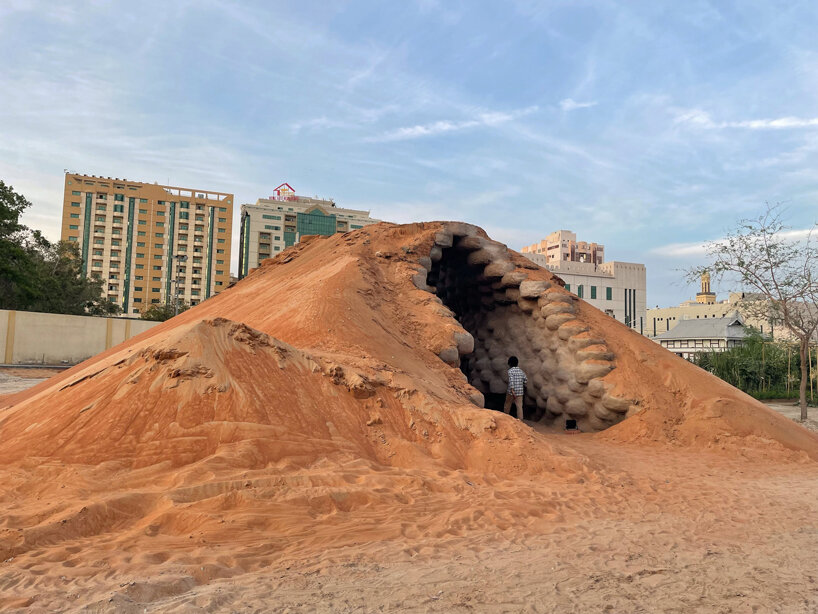 wallmakers uses 1,425 discarded tires coated in desert sand for sharjah triennial pavilion