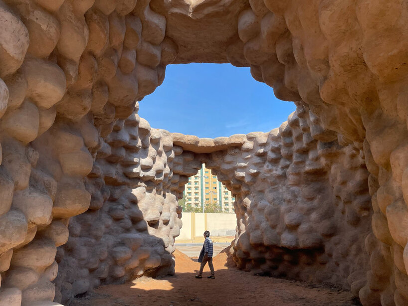 wallmakers uses 1,425 discarded tires coated in desert sand for sharjah triennial pavilion