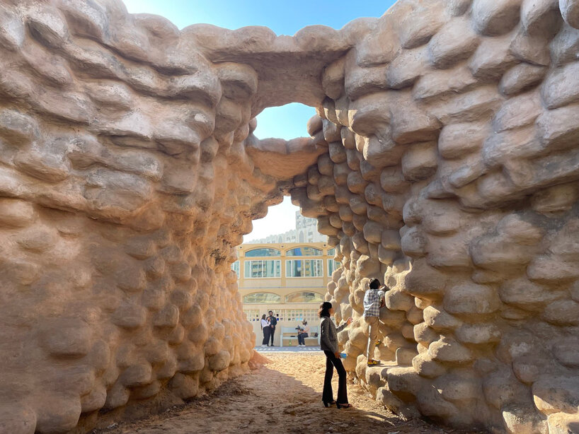 wallmakers uses 1,425 discarded tires coated in desert sand for sharjah triennial pavilion