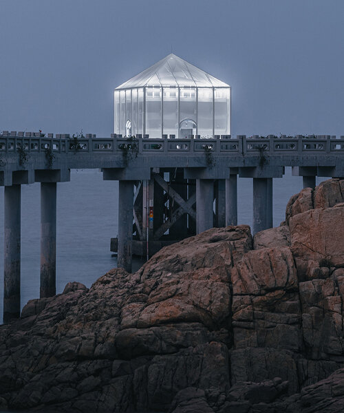covered in sheer white mesh, this daydream trail station casts a poetic glow in coastal china