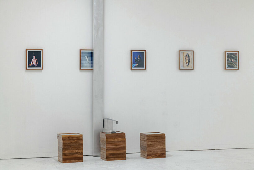 robots endlessly sort through photographs in oliver frank chanarin's latest show at KARST