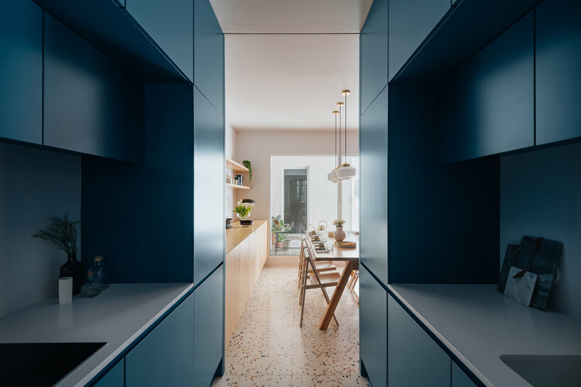 ala.rquitectos integrates light-filled courtyard into renovated lisbon apartment