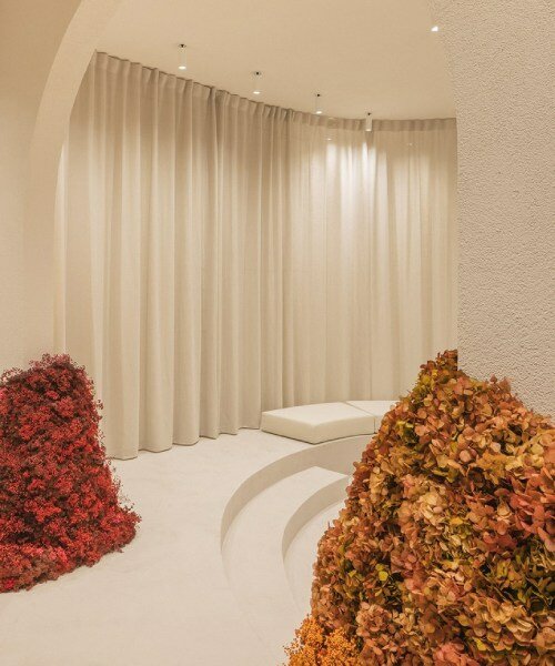 clap studio and amiguis' floral installation at valencia showroom welcomes spring