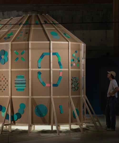whirring panels animate pinaffo & pluvinage's cardboard installation, powered solely by sand 