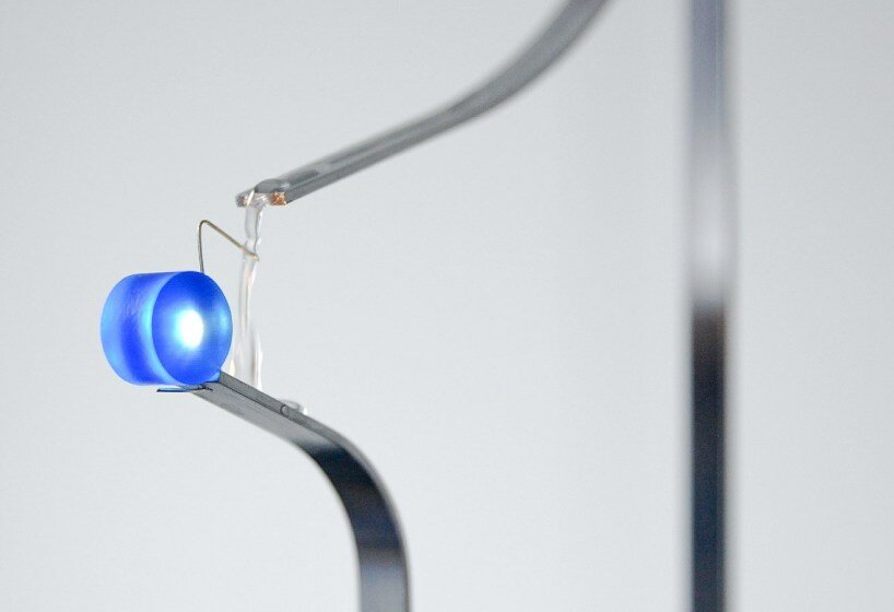 water droplets become conduits for electrical energy in sander hagelaar’s installation