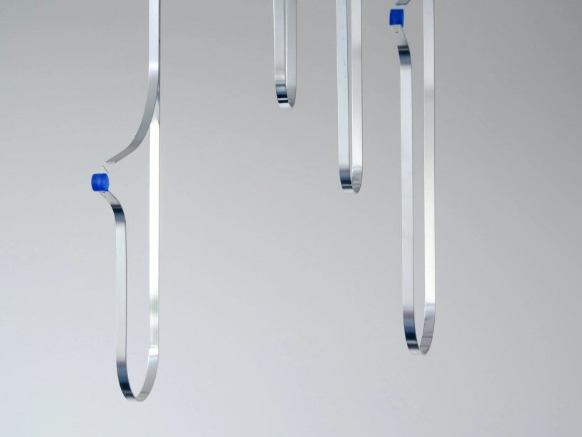 water droplets become conduits for electrical energy in sander hagelaar’s installation