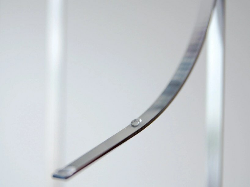 water droplets become conduits for electrical energy in sander hagelaar’s installation