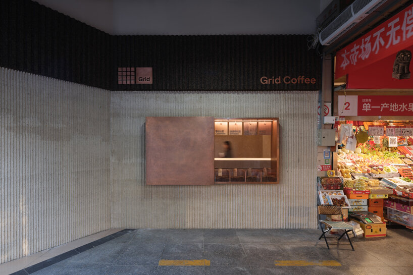 tiny café by B.L.U.E. architecture studio pops amidst traditional marketplace in beijing