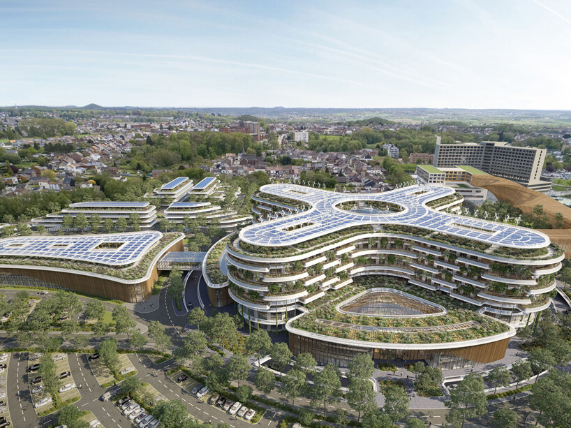 Vincent Callebaut's biophilic hospital campus in Belgium stretches around a flower-shaped atrium