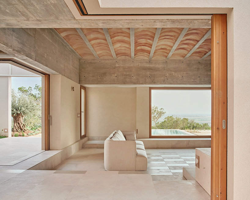 vaulted ceilings and arabic tiles shape ripolltizon's island house in mallorca
