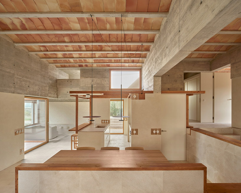 vaulted ceilings and arabic tiles shape ripolltizon's island house in mallorca