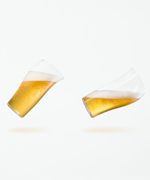 nendo shapes glass with three drinking sides to enrich draft beer’s flavor and aroma