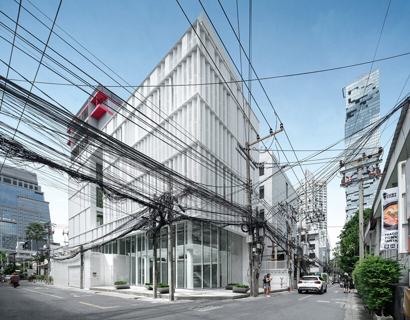 zigzag curtain wall enfolds silom residence's living units in bangkok