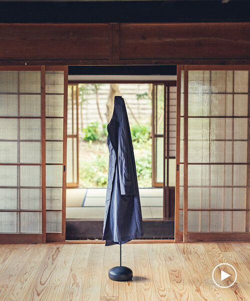 spindle coat rack by koichi futatsumata gently sways when garments are hung on it