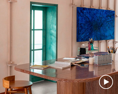 mediterranean hues flow into renovated artist studio space in india